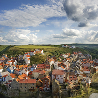 Buy canvas prints of Late afternoon light on the village of Staithes by Richard Burdon