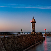 Buy canvas prints of Whitby pier at sunset by Richard Burdon