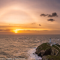 Buy canvas prints of Rough weather off the lighthouse at sunset Isle of Anglesey Nort by Gail Johnson