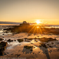 Buy canvas prints of Sunset at the church on the island - St Cwyfan's Anglesey  by Gail Johnson
