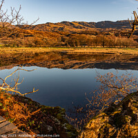 Buy canvas prints of Reflection views around Snowdonia lakes in winter  by Gail Johnson