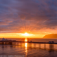 Buy canvas prints of Sunrise over llandudno Pier with the tide in  by Gail Johnson