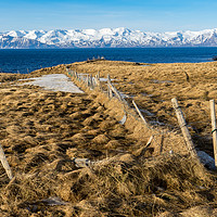 Buy canvas prints of Húsavík and a  sea arch Icelandic Views by Gail Johnson