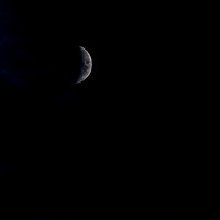 Buy canvas prints of Emerging Moon - Night time by Glen Allen