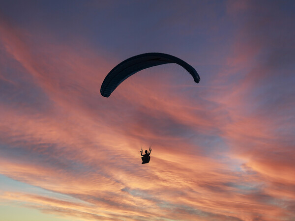 Paragliding the Sunset Picture Board by Glen Allen