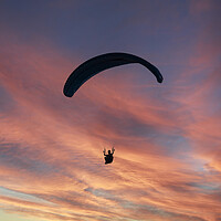 Buy canvas prints of Paragliding the Sunset by Glen Allen