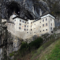 Buy canvas prints of Predjama Castle, Slovenia                          by Stephen Maxwell