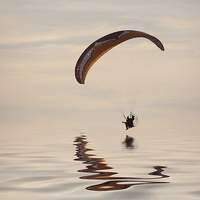 Buy canvas prints of Powered paraglider by John Edwards