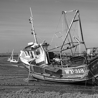 Buy canvas prints of Monochrome of Whitby Crest at Brancaster Staithe by John Edwards