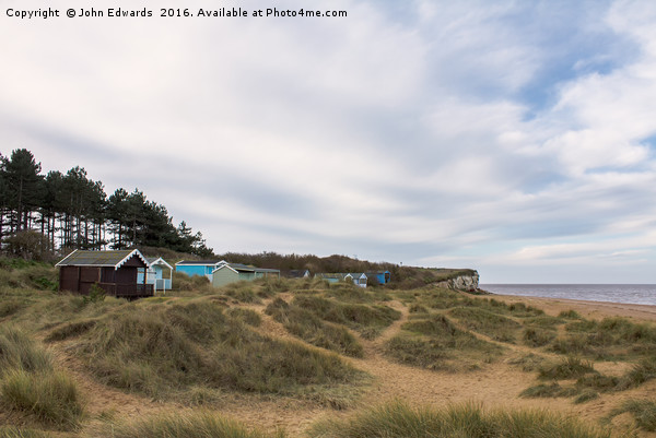 Beach Huts in the Marram Grass Picture Board by John Edwards