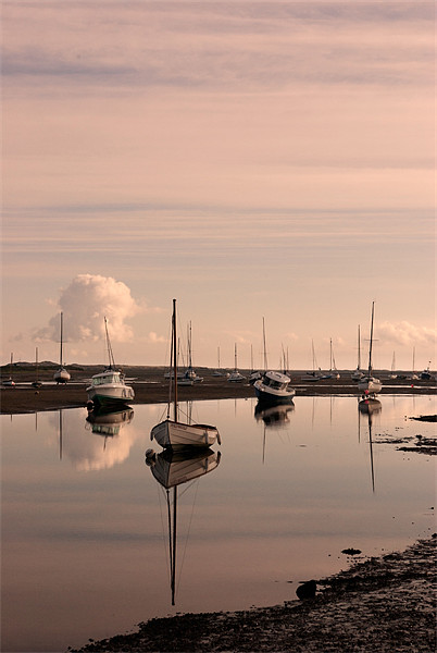 Reflections at Brancaster Staithe, Norfolk,UK Picture Board by John Edwards