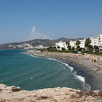 Buy canvas prints of El Chucho beach, Nerja, Andalusia, Spain by John Edwards