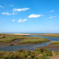 Buy canvas prints of Thornham Creek and the sea by John Edwards