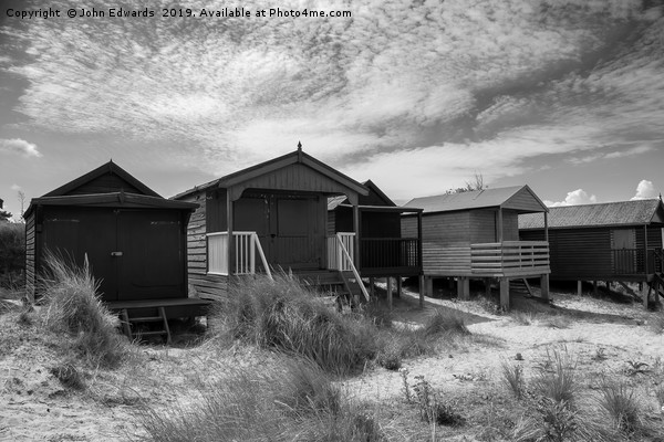Five Huts at Old Hunstanton Picture Board by John Edwards