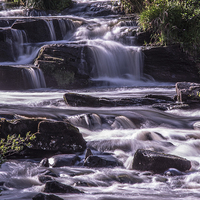 Buy canvas prints of  Cascading Waterfalls by David Irving
