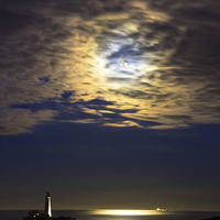Buy canvas prints of Moonrise over St Marys Island by David Irving