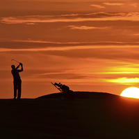 Buy canvas prints of  Golfer at sunset by Richard O'Meara