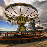 Buy canvas prints of Deserted rides on cleethorpes beach by David Smith