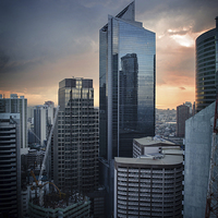 Buy canvas prints of  Manila Skyscraper by ed pratt