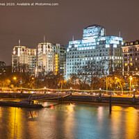 Buy canvas prints of Shell Mex House at night. by Peter Jones