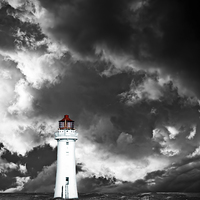Buy canvas prints of Lighthouse with approaching dramatic storm clouds by ken biggs