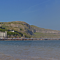 Buy canvas prints of Panoramic shot of Llandudno pier and Great Orme by ken biggs