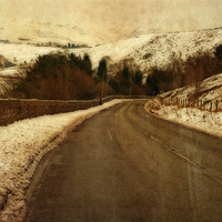 Buy canvas prints of Empty road through snow covered Yorkshire moors by ken biggs