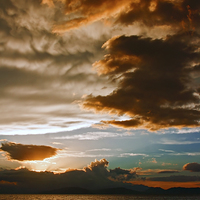 Buy canvas prints of Mammatus clouds at sunset ahead of violent thunder by ken biggs