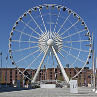 Buy canvas prints of Large ferris wheel at Albert Dock, Liverpool UK by ken biggs