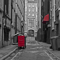 Buy canvas prints of Looking down an empty inner city alleyway by ken biggs