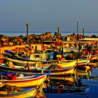 Buy canvas prints of Small fishing boats in harbour by ken biggs