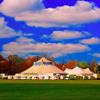 Buy canvas prints of A digitally converted painting of circus tents by ken biggs