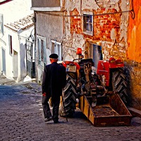 Buy canvas prints of an elderly man walking past a tractor in a Turkish by ken biggs