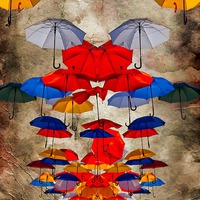 Buy canvas prints of colorful umbrellas against a grungy background by ken biggs