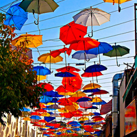 Buy canvas prints of colorful umbrellas in Kaleici Antalya Turkey by ken biggs