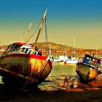 Buy canvas prints of Fishing boats at low tide  by ken biggs