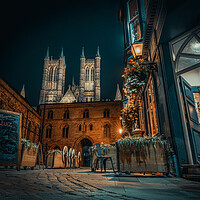 Buy canvas prints of Lincoln Cathedral and the night glow  by Andrew Scott