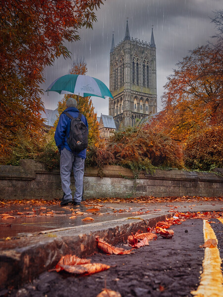 The umbrella man - Lincoln Cathedral Picture Board by Andrew Scott