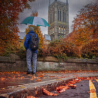 Buy canvas prints of The umbrella man - Lincoln Cathedral by Andrew Scott