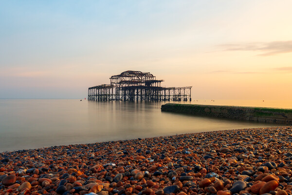 Brighton West Pier at sunset Picture Board by Andrew Scott