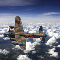 Buy canvas prints of  Avro Lancaster bomber above the clouds by Andrew Scott