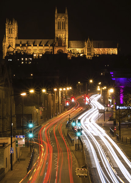  Lincoln Cathedral and light trail Picture Board by Andrew Scott