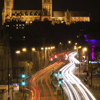 Buy canvas prints of  Lincoln Cathedral and light trail by Andrew Scott