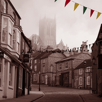 Buy canvas prints of  Lincoln, Steep Hill, on a foggy morning by Andrew Scott