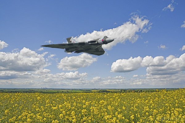  Avro Vulcan XH558 flying over Lincolnshire fields Picture Board by Andrew Scott