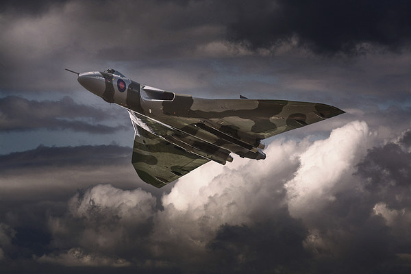  AVRO Vulcan XH558 cruising in moody sky Picture Board by Andrew Scott