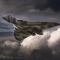 Buy canvas prints of  AVRO Vulcan XH558 cruising in moody sky by Andrew Scott