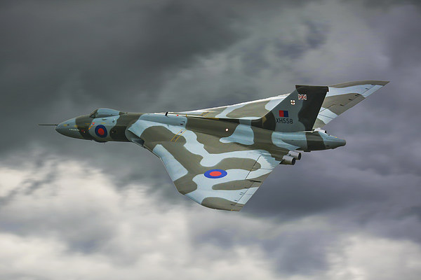 ARVO Vulcan XH558 flying low in moody skies over  Picture Board by Andrew Scott