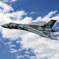 Buy canvas prints of  AVRO Vulcan XH558 high over Lincolnshire skies by Andrew Scott