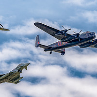 Buy canvas prints of Lancaster Bomber PA474 in special formation by Andrew Scott